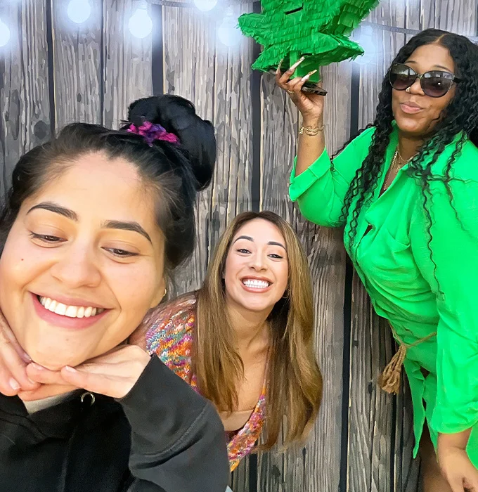 group of friends smiling at photo booth party in Carson California
