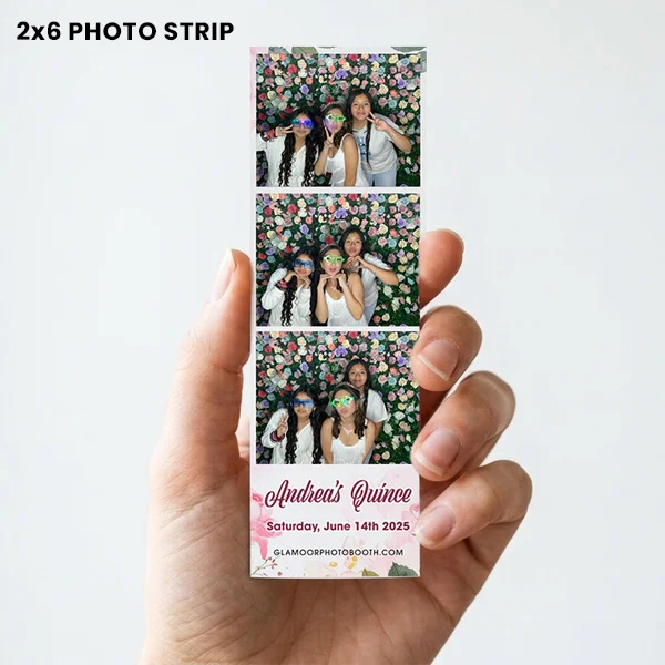 Hand holding a 2x6 photo strip with three group pictures from Andrea’s Quinceañera photo booth in Carson California